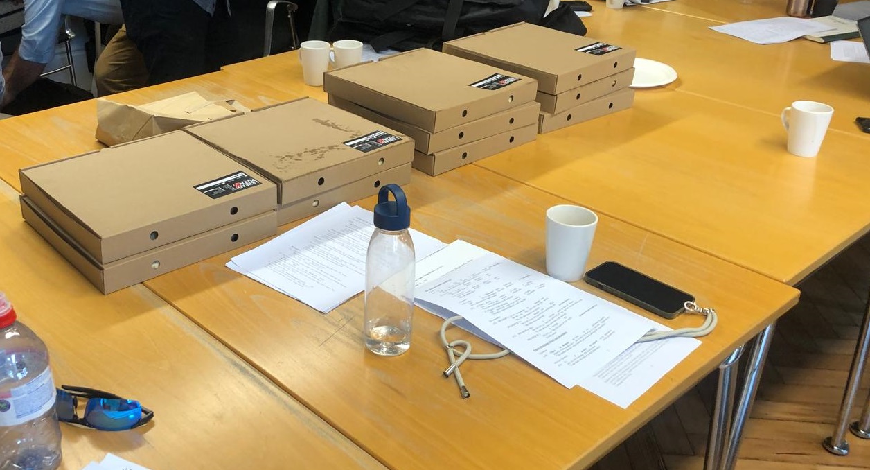 A photo showing a table with pizza boxes at the LEL department